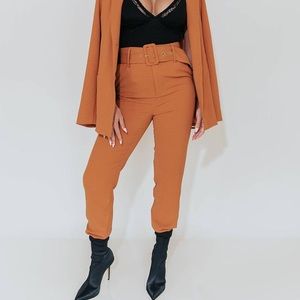 NWT Kittenish Keep it Bossy Belted burnt orange pants size large